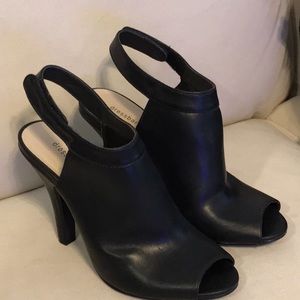 Beautiful black peep toe sling back heels.